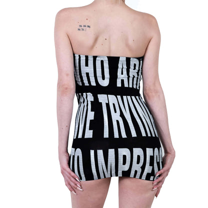 Black strapless dress with white text on a white background